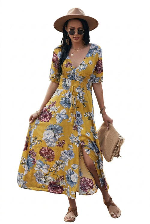 Front view of a woman wearing a floral summer beach dress with a V-neck